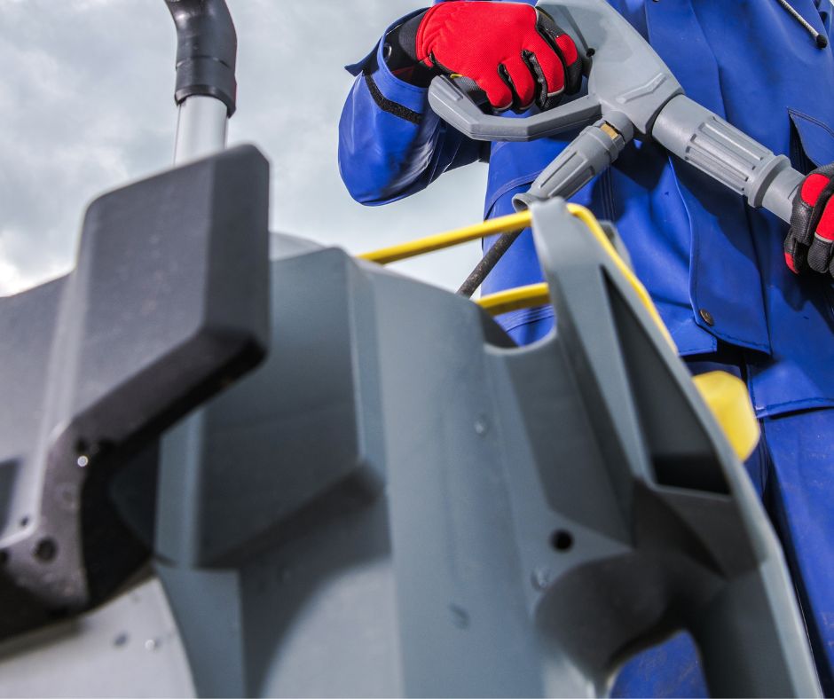 Pressure Washer Holding Pressure Washing Equipment
